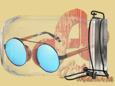 Gafas de sol redondas de metal y madera en el puente. Disponible en madera de cebrano y sándalo rojo