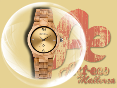 Reloj de madera de olivo. Talla pequeña.