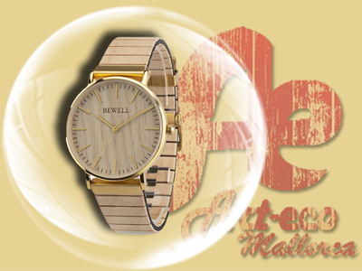 Modelo en acero dorado y madera de olivo